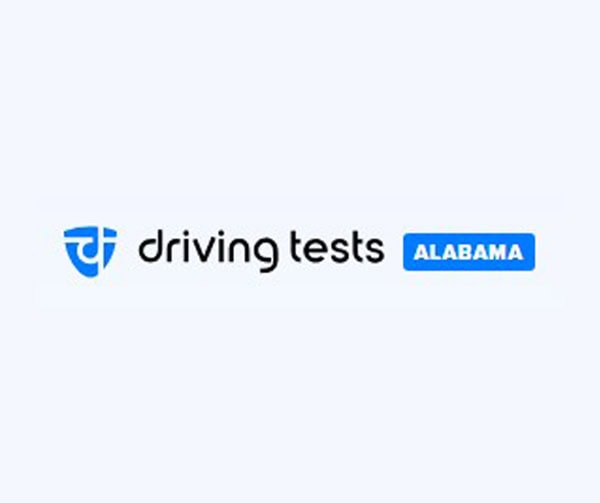 Logo for driving tests Alabama featuring a blue shield icon to the left and the words driving tests in black text with a blue rectangle containing ALABAMA in white capital letters to the right.