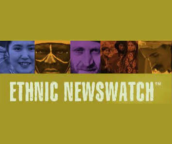 A yellow-green background with the words ETHNIC NEWSWATCH in bold white letters, above a row of diverse human faces shown in different colored panels.