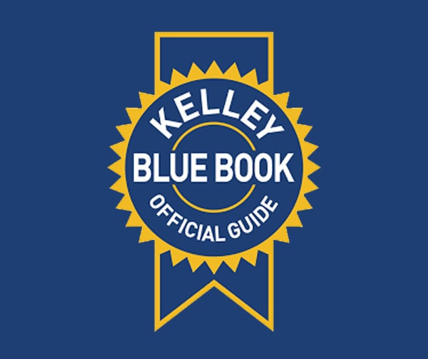 Kelley Blue Book logo featuring a gold and blue ribbon seal with the words Kelley Blue Book Official Guide on a solid blue background.